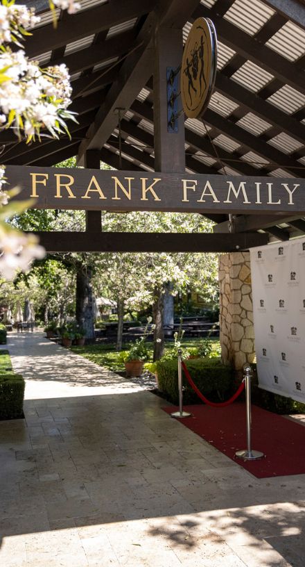 Frank Family's red carpet welcome leading into the estate courtyard