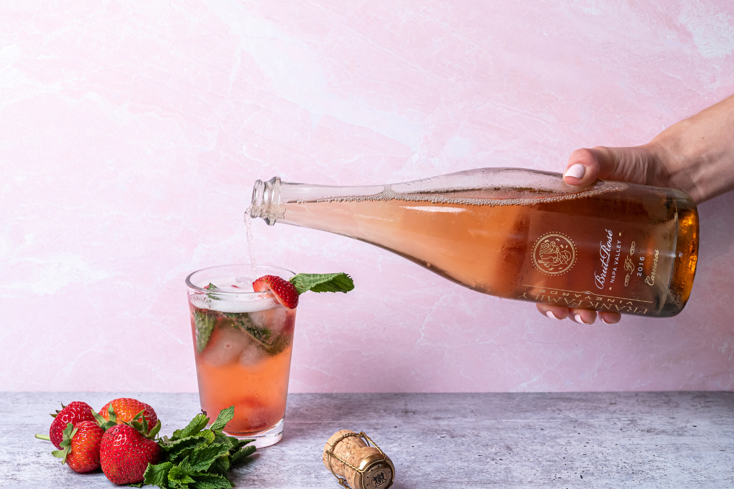 https://www.frankfamilyvineyards.com/blog/wp-content/uploads/2021/08/Sparkling-Strawberry-Mojito-Pour.png