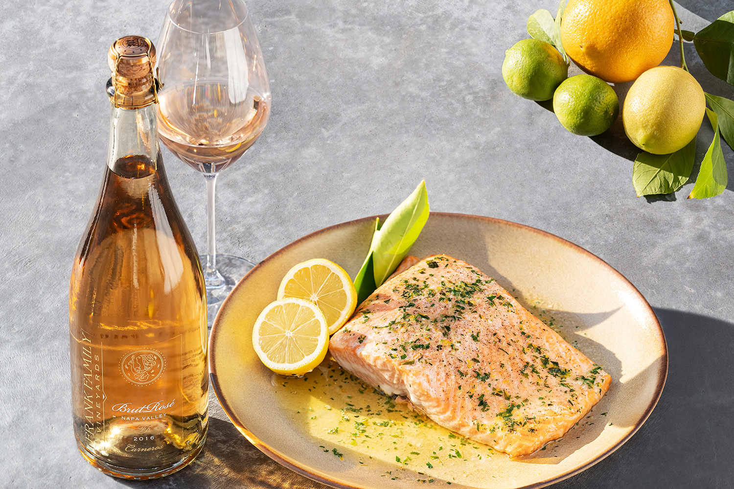 Roasted Salmon with Citrus Tarragon Butter and a bottle of Frank Family's Brut Rosé
