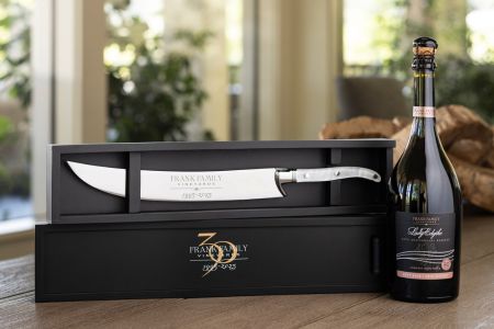 Frank Family's 30th anniversary engraved saber and box