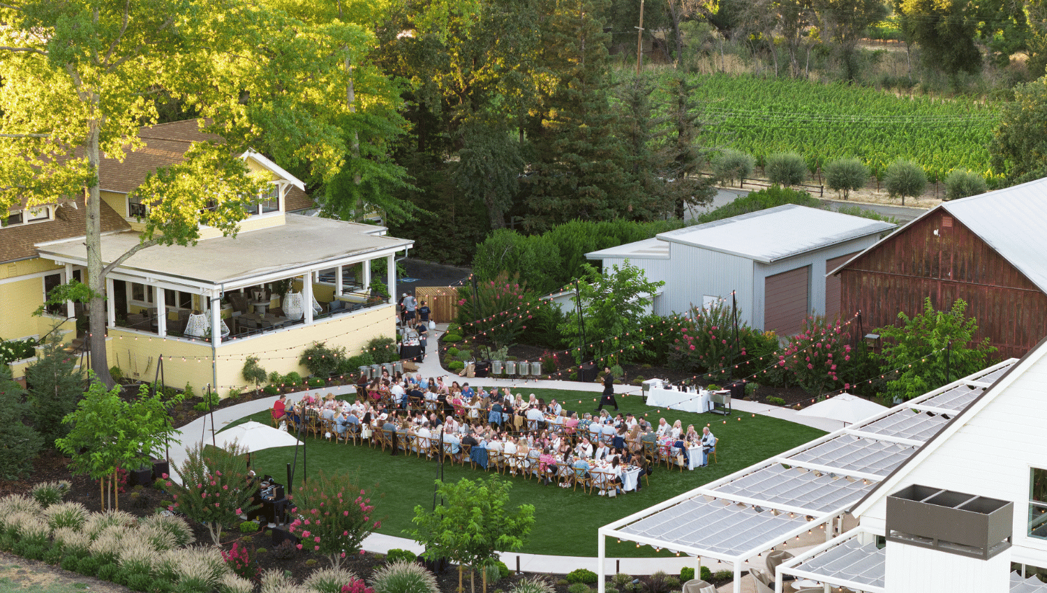 An early evening dinner with dancing and a band on the Miller House Lawn